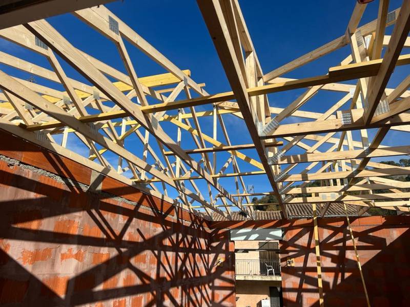réalisation d'une charpente de 150 m2 